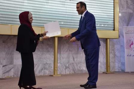 The President of Anbar University honors a number of female faculty members