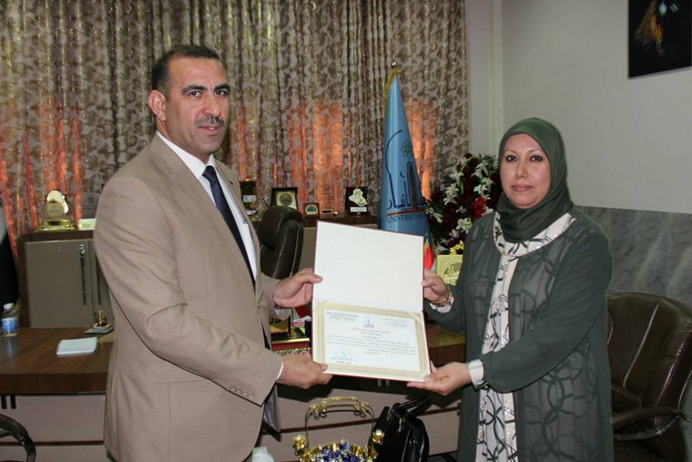 Anbar University President Honors Dr. Nagham Khudair Mahdi 