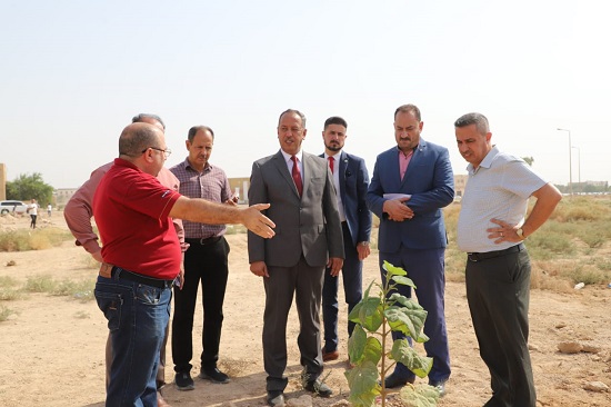 The President of Anbar University reviews the productive forest project